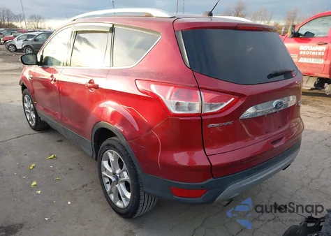 2016 Ford Escape Titanium z USA, uszkodzony, nr VIN 1FMCU0JX7GUC85730